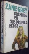 Prendida en sus propias redes