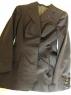 Ropa ecuestre de mujer y fusta